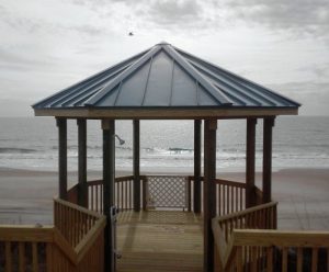Metal roof installed on top of gazebo looking out over the ocean in carolina beach nc