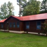red metal roof installed on home in leland nc